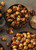 Recipe Detail - Overhead view of Almond CaramelCrisp and Macadamia CaramelCrisp in bowls with flavor cues